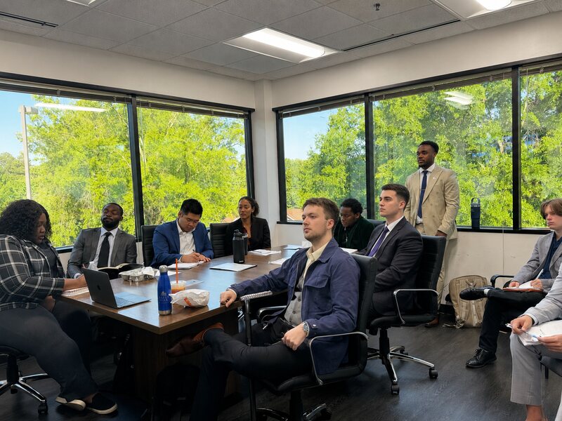 TriMkt team in a training session at the Raleigh office